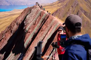Taking photos on the Pallay Punchu Rainbow Mountain