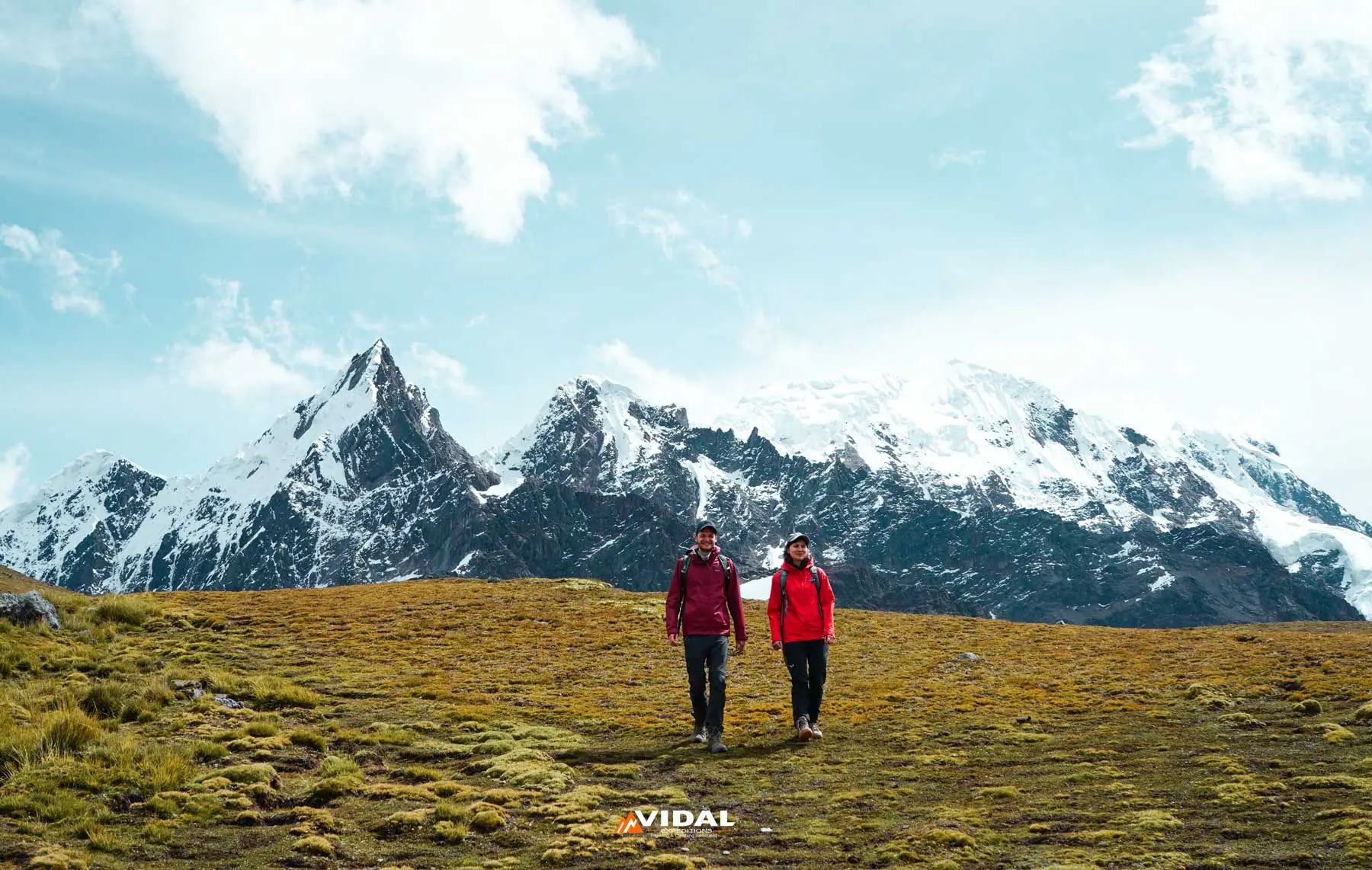 Hikers trekking through the Andes on the Ausangate Trek 6 Days