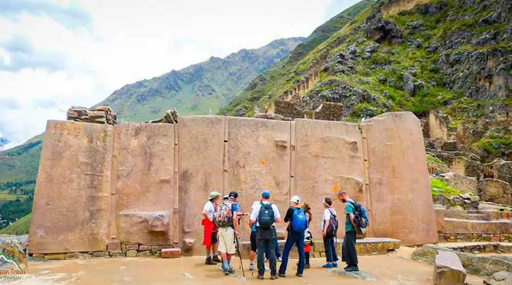 Travelers in front of Ollantaytambo Inca temple