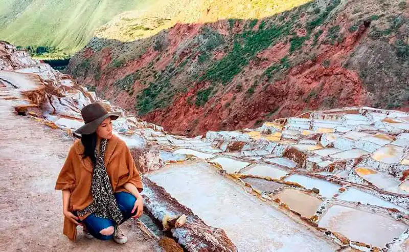 Tourist in the Salt Mines of Maras Sacred Valley