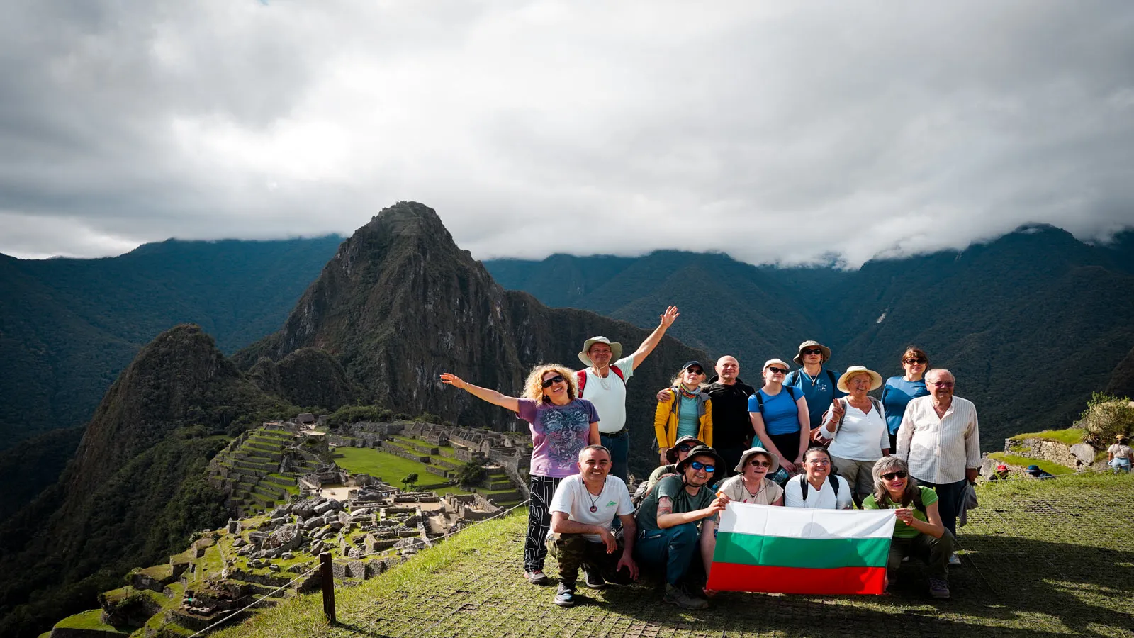 Happy group in Machu Picchu the Seven Wonder