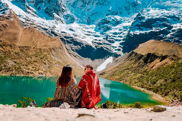 Tourist enjoying Humantay Lagoon